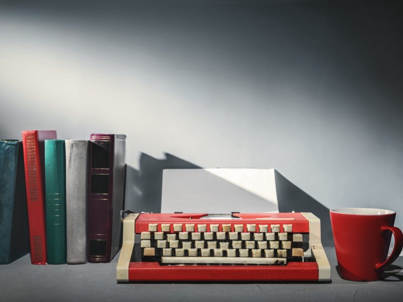 Books A Typewriter And A Mug Of Tea